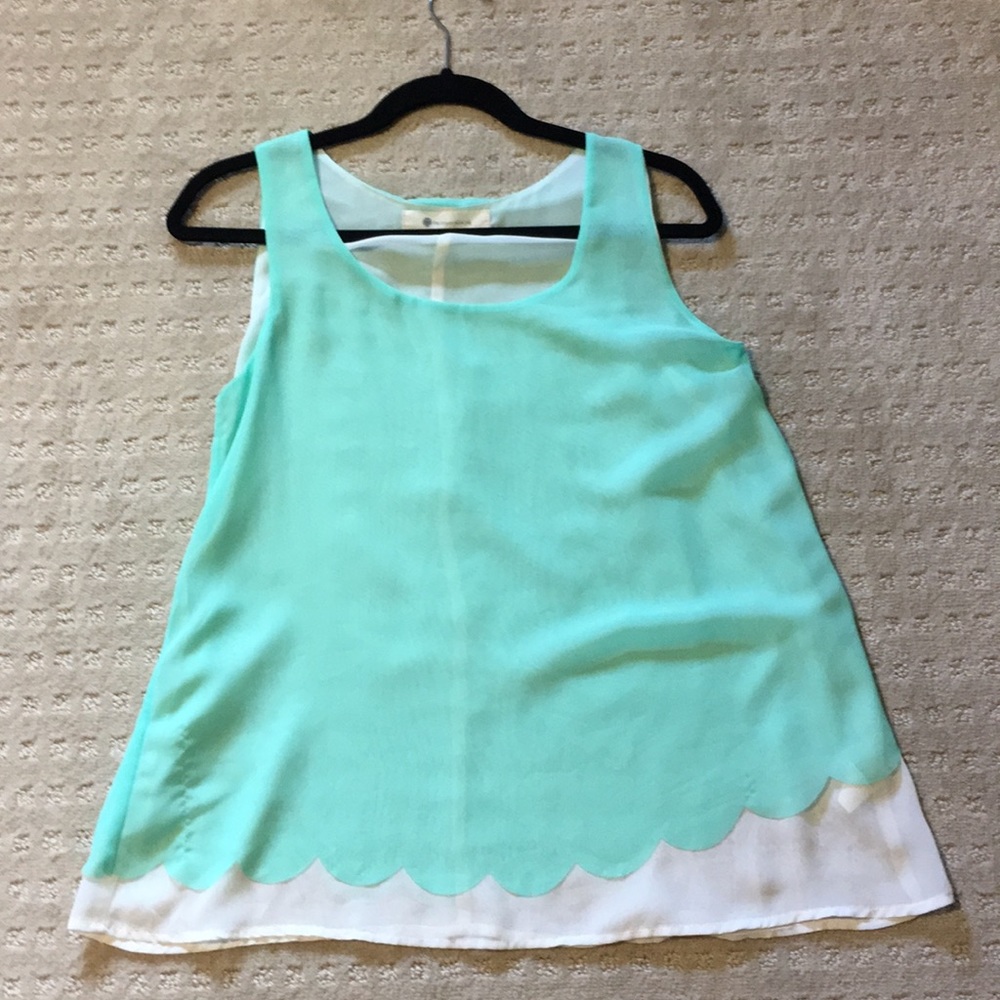 Impeccable pig sleeveless scallop blouse